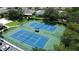 Aerial view of two community tennis courts at 2749 Plantain Dr, Holiday, FL 34691