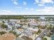 Aerial view of neighborhood with waterfront access and lush landscaping at 306 180Th E Ave, Redington Shores, FL 33708