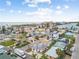 Aerial view of neighborhood near the beach with colorful houses at 306 180Th E Ave, Redington Shores, FL 33708