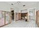 Unfinished bathroom with tiled floor and walls at 306 180Th E Ave, Redington Shores, FL 33708
