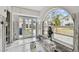 Renovation entryway with window and front door at 306 180Th E Ave, Redington Shores, FL 33708