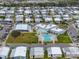 Aerial view of community pool and clubhouse at 34547 Violet N Dr, Pinellas Park, FL 33781