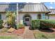 Inviting condo with a charming front porch and well-manicured landscaping at 4366 Summersun Dr, New Port Richey, FL 34652