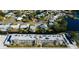 Aerial view of condo complex near water at 4455 Duhme Rd # 304, St Petersburg, FL 33708