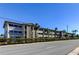 Low-rise condo building with palm trees and landscaping at 4455 Duhme Rd # 304, St Petersburg, FL 33708