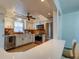 Modern kitchen with stainless steel appliances and white cabinets at 4455 Duhme Rd # 304, St Petersburg, FL 33708