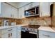Close up of kitchen's stainless steel appliances at 4455 Duhme Rd # 304, St Petersburg, FL 33708