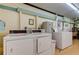 Clean laundry room with multiple washers and dryers at 4455 Duhme Rd # 304, St Petersburg, FL 33708