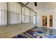 Sunroom features a view into the kitchen and access to the outdoors at 4455 Duhme Rd # 304, St Petersburg, FL 33708