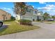 Two-story house with a landscaped yard and driveway at 5037 White Sanderling Ct, Tampa, FL 33619