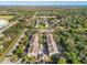 Complex aerial view, showing building layout and parking at 5041 Sunridge Palms Dr # 103, Tampa, FL 33617