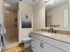 Clean bathroom with granite vanity and walk in shower at 5041 Sunridge Palms Dr # 103, Tampa, FL 33617