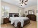 Spacious main bedroom with a king-size bed, and plenty of closet space at 5041 Sunridge Palms Dr # 103, Tampa, FL 33617