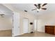 Spacious bedroom with ceiling fan and ample closet space at 5041 Sunridge Palms Dr # 103, Tampa, FL 33617