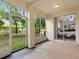 Spacious screened porch with access to the backyard at 5041 Sunridge Palms Dr # 103, Tampa, FL 33617