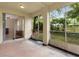 Screened porch with access to backyard at 5041 Sunridge Palms Dr # 103, Tampa, FL 33617