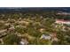 Aerial view of a house nestled in a quiet residential neighborhood at 531 Garrard Dr, Temple Terrace, FL 33617