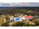 Aerial view showing community pool, tennis courts, and homes at 531 Garrard Dr, Temple Terrace, FL 33617