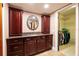 Bathroom with granite vanity, walk-in closet, and tiled floor at 531 Garrard Dr, Temple Terrace, FL 33617