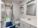 Bathroom with pool access, walk-in shower, and blue mats at 531 Garrard Dr, Temple Terrace, FL 33617