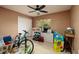 bedroom with toys, bicycle and plenty of natural light at 531 Garrard Dr, Temple Terrace, FL 33617
