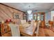 Dining room features hardwood floors and a wood dining table at 531 Garrard Dr, Temple Terrace, FL 33617