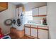 Laundry room complete with washer, dryer, and storage cabinets at 531 Garrard Dr, Temple Terrace, FL 33617