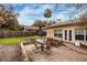 Charming patio with table and chairs, ideal for outdoor dining at 531 Garrard Dr, Temple Terrace, FL 33617