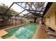Enjoy this refreshing pool with screened enclosure at 531 Garrard Dr, Temple Terrace, FL 33617