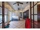 Sunroom with tiled floors and access to the backyard at 531 Garrard Dr, Temple Terrace, FL 33617