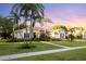 One-story house with attractive landscaping and palm trees at 6020 Kestrel Point Ave, Lithia, FL 33547