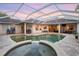 Relaxing pool and spa with covered patio; perfect for outdoor entertaining at 6020 Kestrel Point Ave, Lithia, FL 33547