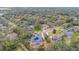 Aerial view showcasing the house and surrounding neighborhood at 6114 Kingbird Manor Dr, Lithia, FL 33547