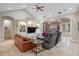 Open living room featuring a high ceiling, recessed lighting and comfortable seating at 6114 Kingbird Manor Dr, Lithia, FL 33547