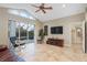 Spacious sitting room with access to pool and patio at 6114 Kingbird Manor Dr, Lithia, FL 33547