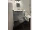 Modern bathroom with gray vanity and marble countertop at 7638 Woodbridge Blvd, Tampa, FL 33615