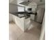 Modern kitchen with stainless steel appliances and granite countertops at 7638 Woodbridge Blvd, Tampa, FL 33615