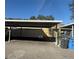 Covered carport parking space at 7638 Woodbridge Blvd, Tampa, FL 33615