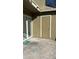 Small patio with exterior storage unit at 7638 Woodbridge Blvd, Tampa, FL 33615