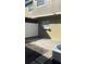 Private patio with concrete slab and fence at 7638 Woodbridge Blvd, Tampa, FL 33615