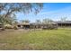 Large backyard with pool, patio, and plenty of green space at 823 Scenic Heights Dr, Brandon, FL 33511