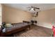 Well-lit bedroom with wood floors and a ceiling fan at 823 Scenic Heights Dr, Brandon, FL 33511