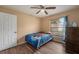 Bedroom with wood floors and ceiling fan at 823 Scenic Heights Dr, Brandon, FL 33511