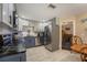 Updated kitchen with stainless steel appliances and granite countertops at 823 Scenic Heights Dr, Brandon, FL 33511