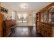 Home office features wood floors, built-in cabinetry, and a view of the pool at 823 Scenic Heights Dr, Brandon, FL 33511
