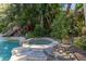 Relaxing spa nestled in a lush, tropical garden at 8755 Commodore Dr, Seminole, FL 33776