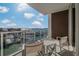 Relaxing balcony with water views and outdoor seating at 920 N Osceola Ave # 507, Clearwater, FL 33755