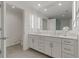 Modern bathroom with double vanity and large mirror at 920 N Osceola Ave # 507, Clearwater, FL 33755