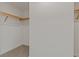 Large walk-in closet with built-in shelves at 920 N Osceola Ave # 507, Clearwater, FL 33755