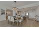 Open concept dining room with kitchen view and chandelier at 920 N Osceola Ave # 507, Clearwater, FL 33755